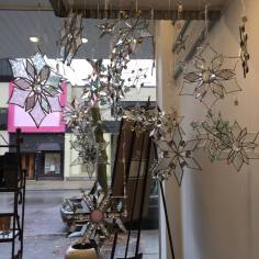 Glass snowflakes for sale at Forty-Five North Art Gallery.